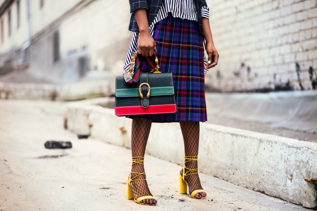 Girl holding Gucci Dionysus Clutch Bag| 4 Tips For Creating A Greener Wardrobe For Sustainability | Fashion Tips & Guide | Elle Blonde Luxury Lifestyle Destination Blog | Professional Photos