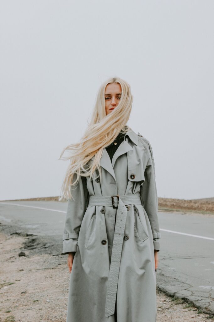 Blonde girl in trench coat | 4 Tips For Creating A Greener Wardrobe For Sustainability | Fashion Tips & Guide | Elle Blonde Luxury Lifestyle Destination Blog
