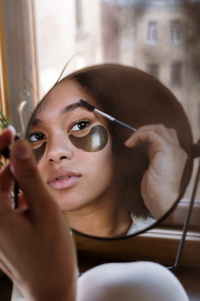 Woman plucking eyebrows | 5 Eyebrow Shaping Tools | Beauty | Elle Blonde Luxury Lifestyle Destination Blog