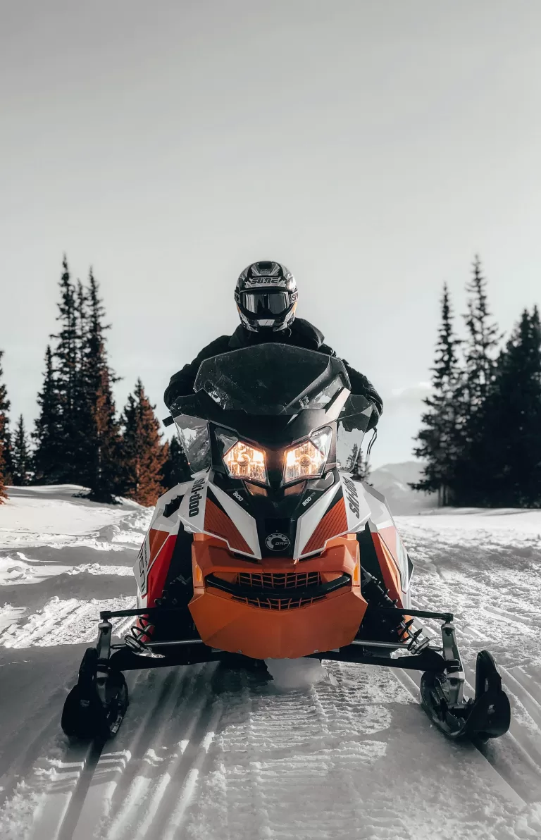 Read more about the article Riding a Snowmobile: The Ultimate Beginner’s Guide