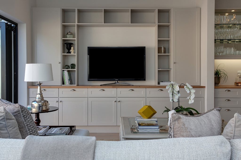 The Art of the Living Room: How to Choose a Television That Complements Your Decor 3 Stylish contemporary living room featuring elegant furniture and decor, perfect for home interiors.